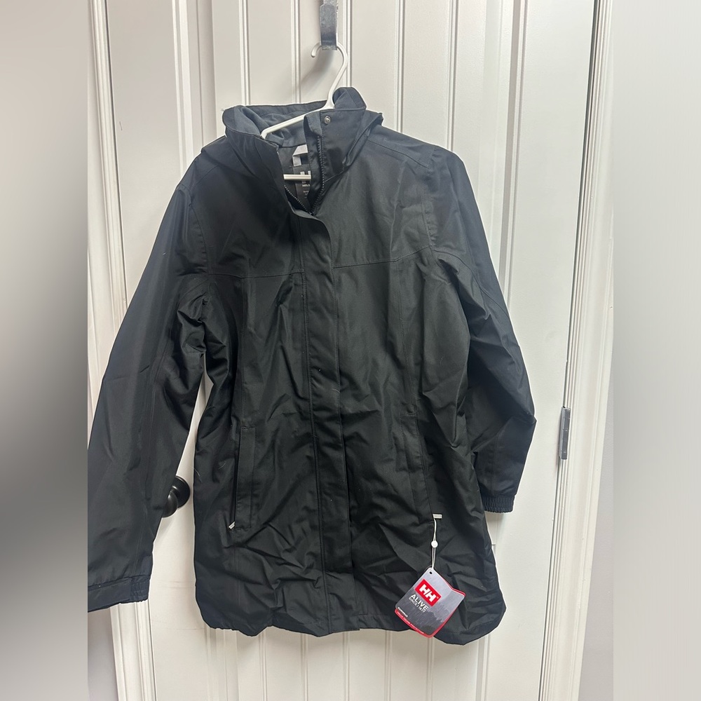 Helly Hansen rain coat. New with tags. Size medium.